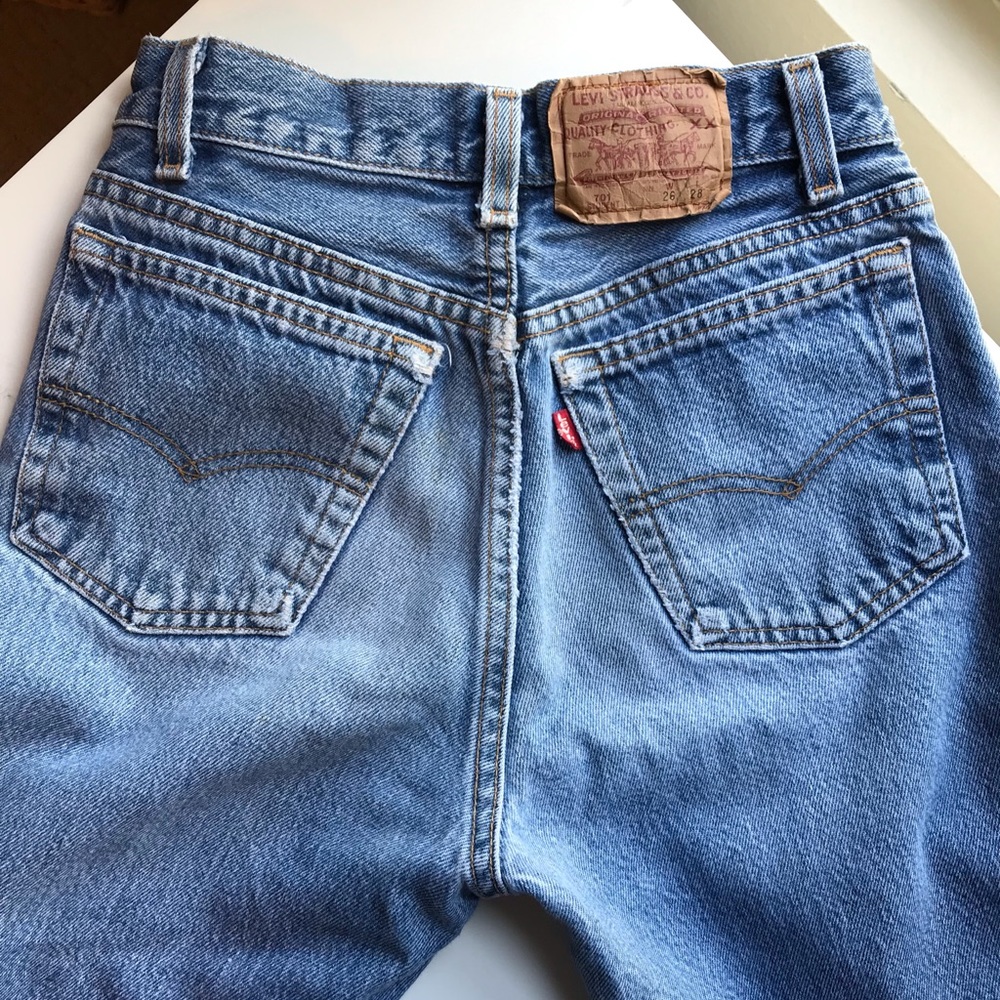 Vintage Levi’s 701 student fit light blue jeans